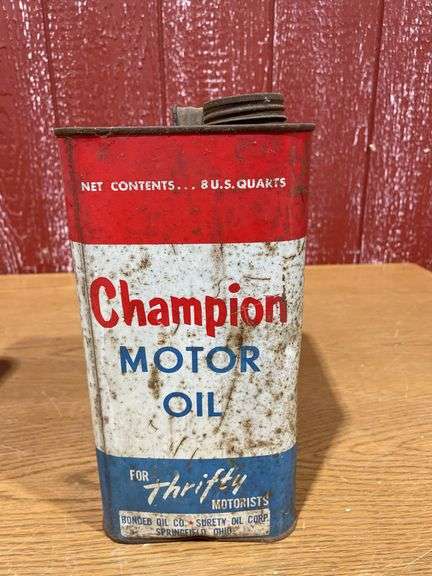 (4) vintage two-gallon motor oil cans,