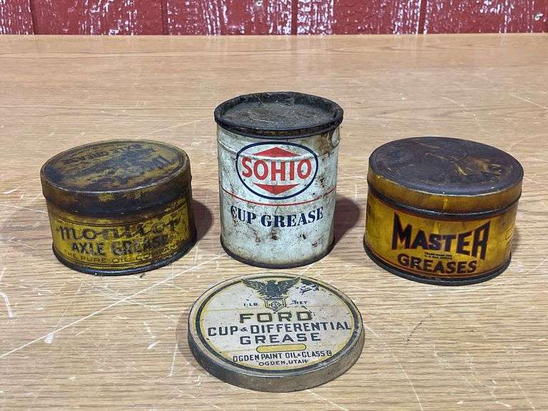 Lot of Vintage Grease Cans image