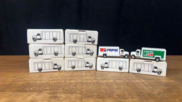 (8) 1/64 Pepsi + Mt. Dew Trucks NIB Ertl image