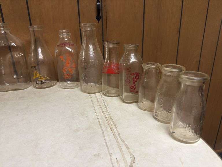 (16) Dairy Bottles