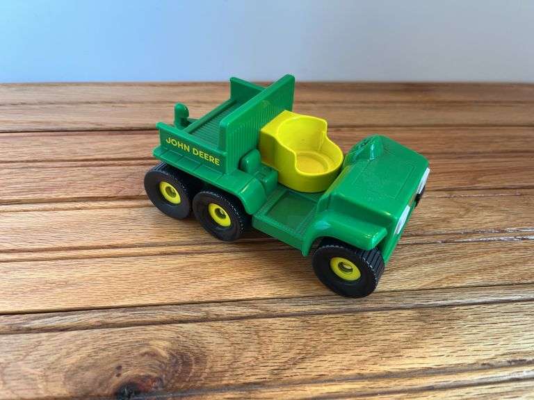 (4) John Deere Toys