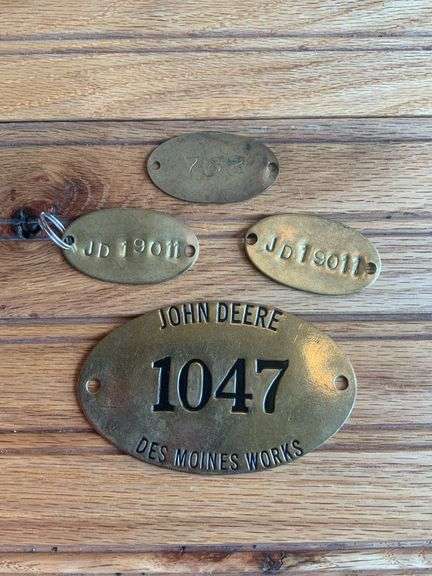 (4) John Deere Brass Tags