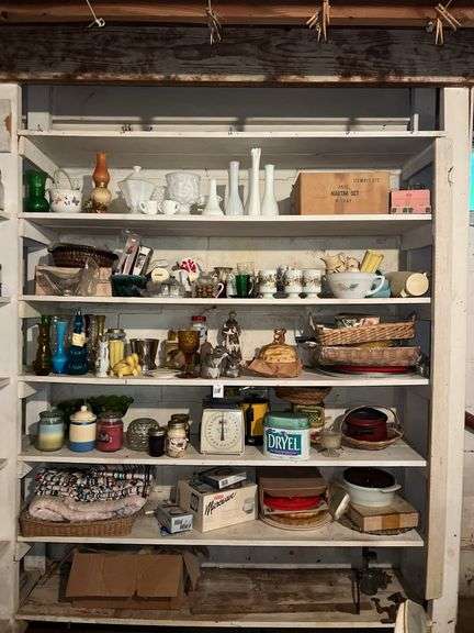 Shelf of Assorted Glass and Vases image