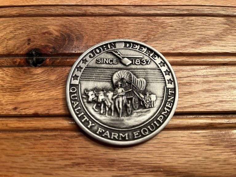 (2) John Deere Medallions