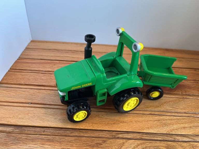 (4) John Deere Toys