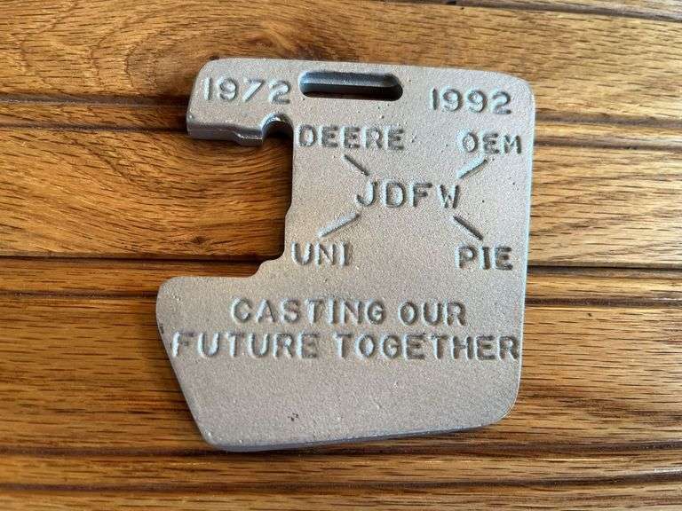 (2) John Deere Medallions