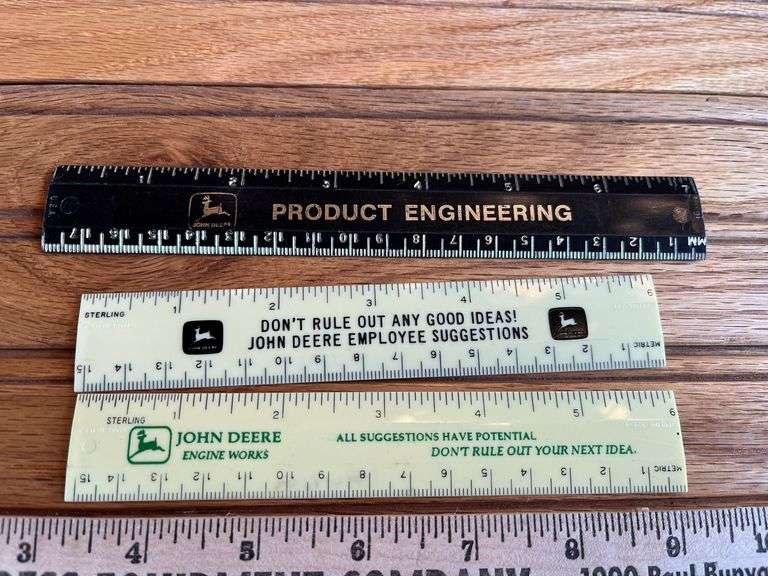 (4) John Deere Rulers