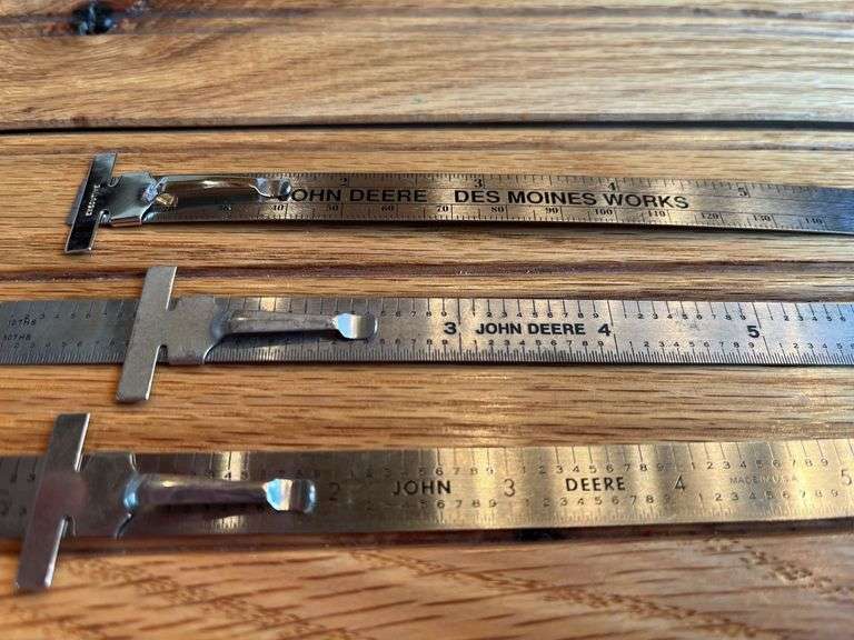 (3) John Deere Metal Rulers