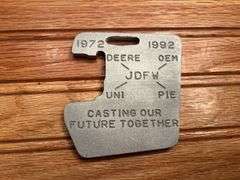 (2) John Deere Medallions