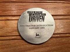 (2) John Deere Medallions