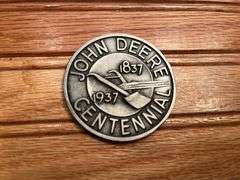 (3) John Deere Medallions
