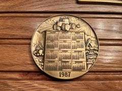 (4) John Deere Calendar Medallions