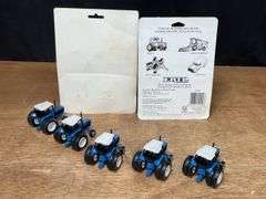 (7) 1/64 Ford Tractors
