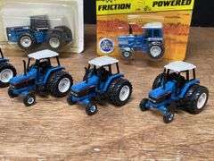 (7) 1/64 Ford Tractors