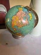 Globe and Paper Roll