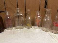 (16) Dairy Bottles