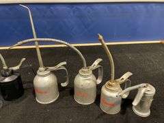 (7) Oil Cans
