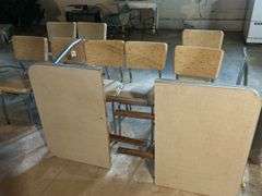 Vintage Table with Assorted Chairs