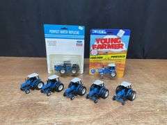 (7) 1/64 Ford Tractors