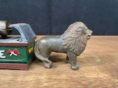 Cast Iron Banks + Lion