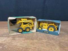 (2) 1/16 John Deere Skid Loader + BI NIB Ertl