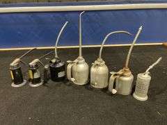 (7) Oil Cans