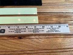 (4) John Deere Rulers