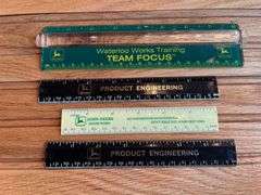 (4) John Deere Rulers