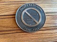 (2) John Deere Medallions