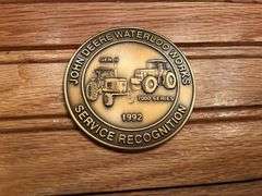 (3) John Deere Medallions