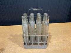 (8) Pure Oil Tiolene Embossed Glass Oil Bottles with (2) Carriers