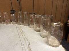 (19) Dairy Bottles and Butter Churn
