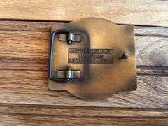 (4) John Deere Belt Buckles