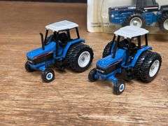 (7) 1/64 Ford Tractors