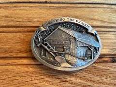 (4) John Deere Belt Buckles