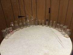 (19) Dairy Bottles and Butter Churn