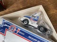 (3) 1/64 Racing Semis NIB