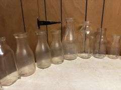 (19) Dairy Bottles and Butter Churn