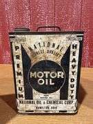 (4) vintage two-gallon motor oil cans,