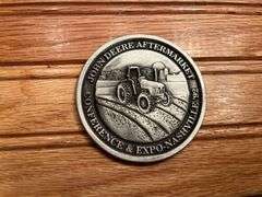 (2) John Deere Medallions