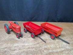 (3) 1/16 Farmall M + Wagons Product Miniature