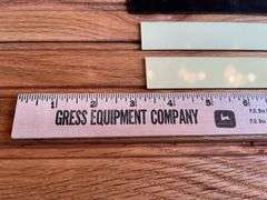 (4) John Deere Rulers
