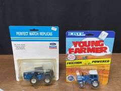 (7) 1/64 Ford Tractors