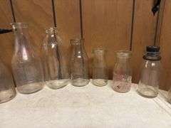 (19) Dairy Bottles and Butter Churn