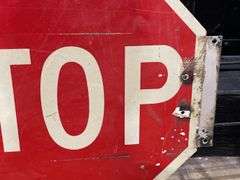 (2) Stop + 35 MPH Signs
