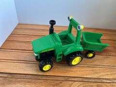 (4) John Deere Toys