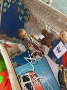 Vintage Wicker Bassinet with Toys