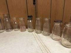(19) Dairy Bottles and Butter Churn