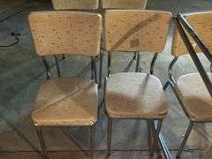 Vintage Table with Assorted Chairs