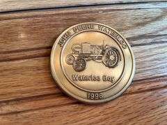 (2) John Deere Medallions